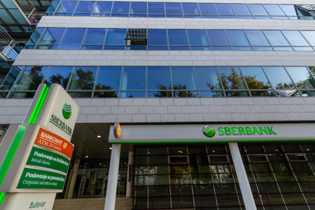 BELGRADE, SERBIA - JULY 26, 2018: Sberbank logo on their subsidiary of new Belgrade, during the afternoon. Sberbank is one of the biggest banks of Russia, present in Balkans

Picture of a Sberbank sign on one of their agencies in downtown Belgrade, Serbiaのeditorial素材