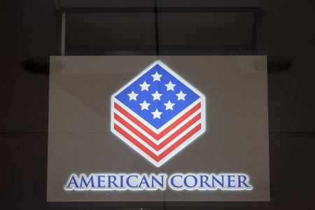 BELGRADE, SERBIA - AUGUST 25, 2018: Logo of the Belgrade American Corner on their library.  American corners are American-style libraries located within a local partner organizations worldwide

Picture of the American Corner sign on their main office for のeditorial素材