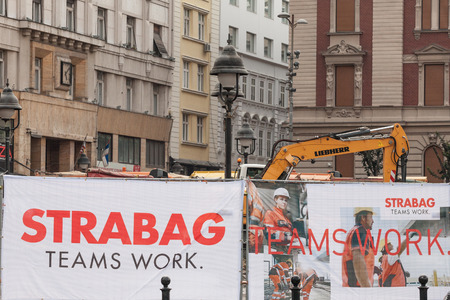 BELGRADE, SERBIA - AUGUST 25, 2018:  Strabag logo on one of their construction sites in Belgrade. Strabag is a construction company from Austria, one of the biggest in Europe

Picture of a sign with the Strabag logo on one of their construction sites in aのeditorial素材
