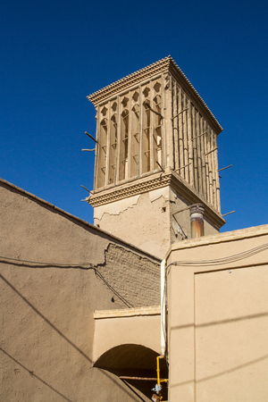 typical Windtower made of clay taken in the streets of Yazd, iran. These towers, aimed at cooling down buildings in the desert, are an icon of the Persian architecture, and a symbol of Yazd

Picture of a windtower taken in the Iranian city of Yazd, duringのeditorial素材
