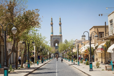 YAZD, IRAN - AUGUST 18, 2016: Jameh mosque, with its distinctive tiles minarets, seen from a nearby street. Jameh mosque is one of the symbols of the city of Yazd, in the middle of the desert, in Yazd, Iran

Picture of the iconic Jameh Mosque taken from aのeditorial素材