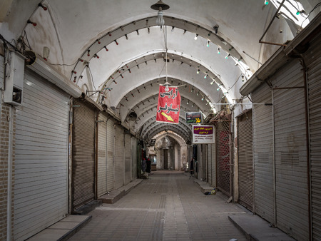 ISFAHAN, IRAN - AUGUST 19, 2018: Street of the Yazd Khan bazar in the afternoon, empty and deserted, in a covered alley of the market. Symbol of the Persian architecture, it's a major landmark of the city

Picture of a covered street of the Yazd khan bazaのeditorial素材