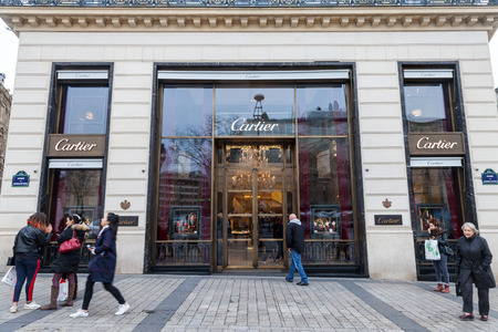 PARIS, FRANCE - DECEMBER 20, 2017: Cartier logo on their main shop on Champs Elysee avenue. Cartier is a French luxury goods conglomerate company which designs, manufactures, distributes, and sells jewellery and watches

Logo of Cartier on their main shopのeditorial素材