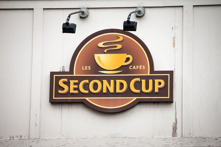 MONTREAL, CANADA - NOVEMBER 5, 2018: Second Cup Coffee logo in front of their local cafe in downtown Montreal, Quebec. Second Cup Coffee is a Canadian cafe and coffee shops brandのeditorial素材