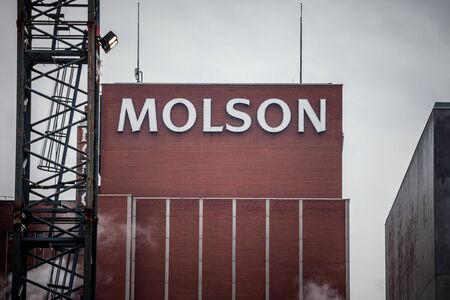 MONTREAL, CANADA - NOVEMBER 5, 2018: Molson Coors logo on Molson Brewery brick tower in downtown...