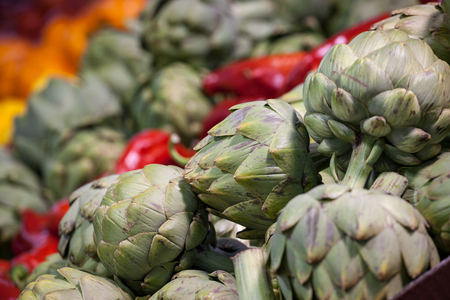 Buckets of Globe Artichokes for sale in Montreal, Quebec. Artichokes are massively produced in America, and consumed most of the Northern American continentの写真素材