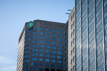 MONTREAL, CANADA - NOVEMBER 4, 2018: Desjardins Bank logo on their main office for Montreal, Quebec, in the Complexe Desjardins. Mouvement Desjardins Banque is the main bank in Quebecのeditorial素材