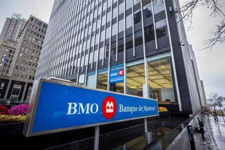 MONTREAL, CANADA - NOVEMBER 3, 2018: Bank of Montreal logo, known as BMO, in front of their main office. Called as well banque de Montreal, it is one of the main banks of Quebec and Americaのeditorial素材