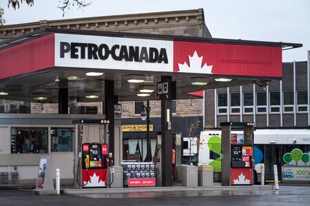 MONTREAL, CANADA - NOVEMBER 6, 2018: Petro-Canada logo in front of one of their gas stations in Canada. Belonging to Suncor Energy, petro Canada is a petrol station brand spread in Canadaのeditorial素材