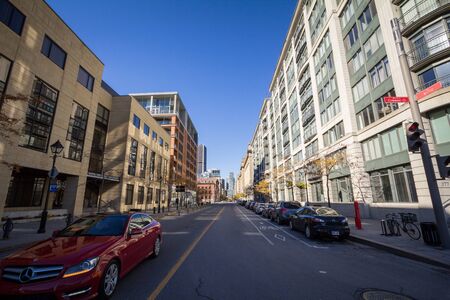 MONTREAL, CANADA - NOVEMBER 4, 2018: Business skyscrapers in the dowtown of Montreal, seen from a nearby street of the main city of Quebec, a symbol of the Canadian economyのeditorial素材
