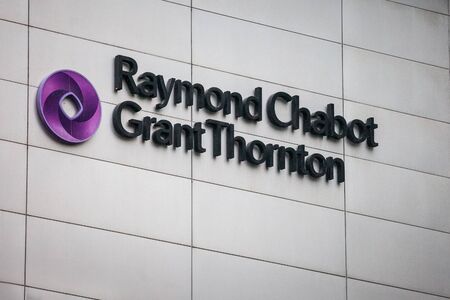 MONTREAL, CANADA - NOVEMBER 6, 2018: Raymond Chabot Grand Thornton logo on one of their heaquarters...