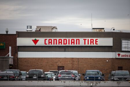 MONTREAL, CANADA - NOVEMBER 9, 2018: Canadian Tire logo in front of one of their stores in Montreal, Quebec. Canadian Tire is a retailer of hardware, automotive and leisure appliancesのeditorial素材