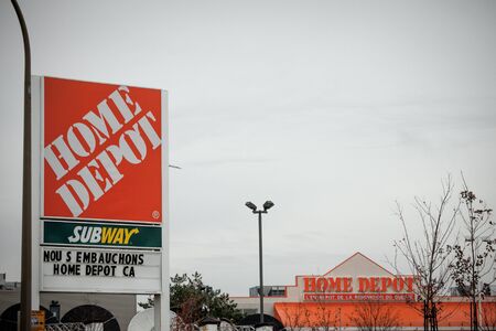 MONTREAL, CANADA - NOVEMBER 9, 2018: Home Depot logo in front of one of their stores in Canada. The Home Depot is an american chain of hardware and appliances storesのeditorial素材