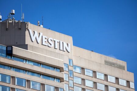 OTTAWA, CANADA - NOVEMBER 11, 2018:  Westin logo on their main hotel in Ottawa, Ontario. Westin is a worldwide brand, owner and franchise of luxury hotels belonging to Marriott

Picture of the Westin sign on their hotel in Ottawa, Ontario, Canada. Westin のeditorial素材