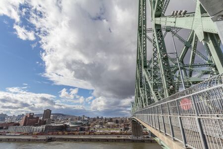 MONTREAL, CANADA - NOVEMBER 8, 2018: Jacques Cartier bridge with the Molson brewery in background....