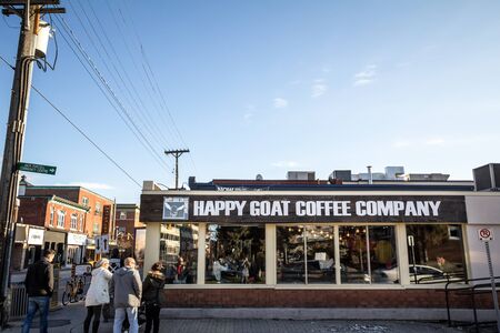 OTTAWA, CANADA - NOVEMBER 11, 2018:  Happy Goat Coffee Company Logo on their main shop and coffee house in Ottawa. Happy Goat is an Ontario fair trade coffee shop and cafes brand

Picture of a Happy Goat Coffee Company sign on their store in Ottawa, Ontarのeditorial素材
