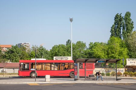 BELGRADE, SERBIA - APRIL 29, 2018: Man waiting alone on the bus stop of New Belgrade terminal, one of the main hub of Belgrade GSP, the public transportation system of the city

picture of a man waiting to board an urban bus in Belgrade, Serbia, on the buのeditorial素材