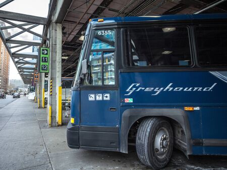 TORONTO, CANADA - NOVEMBER 14, 2018: Greyhound logo on a  motorcoach bus parked on Toronto coach station. Greyhound Canada is one of the main intercity coach carriers in north America

picture of a Greyhound Canada bus waiting for boarding on Toronto Coacのeditorial素材
