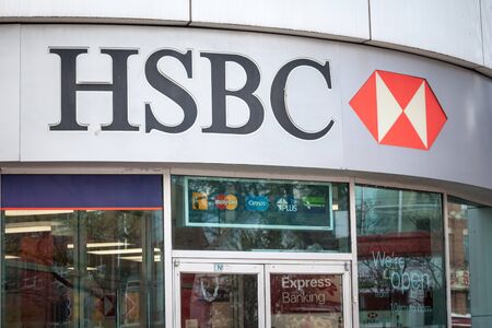 TORONTO, CANADA - NOVEMBER 14, 2018: Logo of the HSBC Bank, on their main branch in Toronto, Ontario. HSBC is a british bank spread worldwide

Picture of a sign with the logo of the HSBC Bank on its local branch in Toronto, Ontario. HSBC Bankis a british のeditorial素材