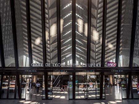 LYON, FRANCE - JULY 13, 2019: Lyon Saint Exupery Airport Train station main entrance with the logo of French Railways, SNCF. It is the station connecting Aeroport de Lyon Airport 

Picture of the main entrance to the train station of Lyon Saint Exupery, tのeditorial素材