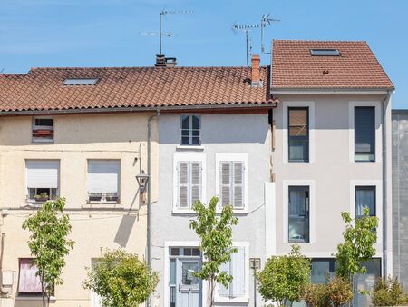 Facades of typical village and town buildings of the city center of Bourgoin Jallieu, in Dauphine...