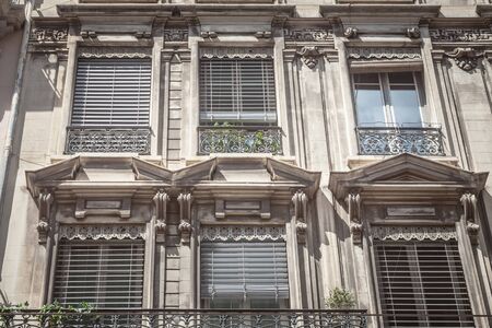 Typical Haussmann style facades, from the 19th century, traditional in the city centers of French...