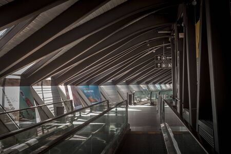 LYON, FRANCE - JULY 13, 2019: Travelator and Moving Walkway in Lyon Airport, also called Aeroport de...