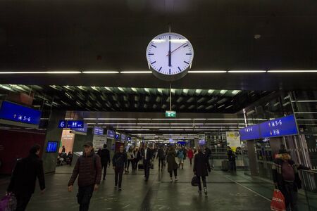 VIENNA, AUSTRIA - OCTOBER 30, 2019: Main lobby of Wien Hauptbahnhof with passengers rushing to get...