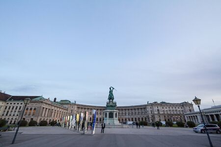 VIENNA, AUSTRIA - NOVEMBER 6, 2019: Hofburg palace, on its Neue Burg aisle, taken from the Heldenplatz square, with the 19th century Prinz Eugen statue in front. It is the former Austro Hungarian imperial palace.

Picture of the statue of Prince Eugene (Pのeditorial素材