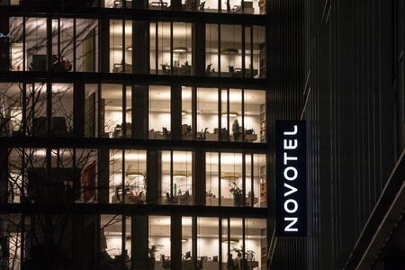 VIENNA, AUSTRIA - NOVEMBER 6, 2019: Novotel logo on their main hotel for Vienna during the evening. Novotel is a hotel chain of the Accorhotel group, spread in Europe and the World.

Picture of a Novotel sign on their main hotel in Vienna, Austria. Novoteのeditorial素材