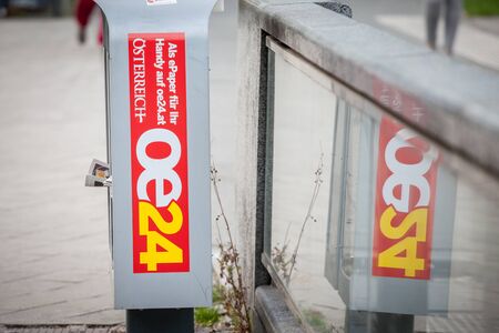 VIENNA, AUSTRIA - NOVEMBER 6, 2019: Oe24 logo in front of a newspaper stand in Vienna. Oe24 is the...