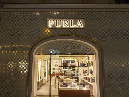 VIENNA, AUSTRIA - NOVEMBER 6, 2019: Furla logo in front of their main boutique for Vienna. Furla is a luxury fashion designer, manufacturer and retailer from Italy.

Picture of a sign with the logo of Furla taken on their main store for Vienna, Austria. Fのeditorial素材