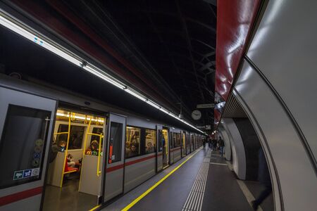 VIENNA, AUSTRIA - NOVEMBER 6, 2019: Karlsplatz u-bahn station with a metro standing with open doors ready for departure in the Vienna Underground, the mass transit system of the city.Picture of a metro train standing in the subway station of Karlspatz wのeditorial素材