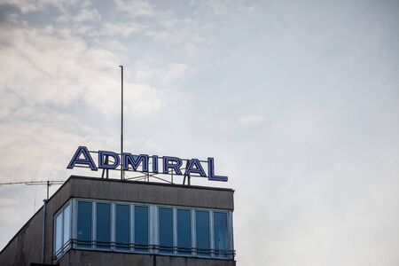 VIENNA, AUSTRIA - NOVEMBER 6, 2019: Admiral logo taken on their office for Vienna. Admiral is a multinational chain of Casinos and betting, gambling and slot machine parlors.Picture of a sign with the logo of Admiral standing on their main office for Viのeditorial素材