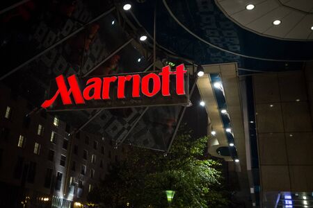 PRAGUE, CZECHIA - NOVEMBER 3, 2019: Marriott logo on their main hotel in Prague. Courtyard Marriott Corporation is a worldwide brand, owner and franchise of luxury hotels.

Picture of the Marriott sign on their hotel in Prague, Czech Republic. Also known のeditorial素材