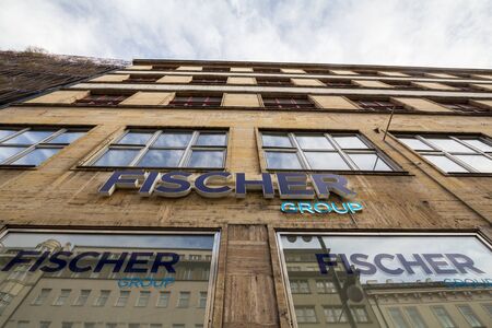 PRAGUE - CZECHIA - NOVEMBER 2, 2019: Fischer Group Cestovni Kancelar logo in front of their boutique in Prague. Fischer Group is a Czech travel agency and travel and leisure retailer.

picture of a sign with the logo of Fischer Group taken on their local のeditorial素材
