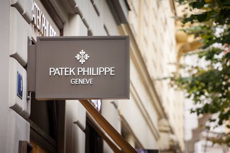 PRAGUE - CZECHIA - NOVEMBER 1, 2019:  Patek Philippe logo on their jewelry boutique in Prague. Patek Philippe is a Swiss luxury watchmaker famous for chronographs and watches.

Picture of a sign with the logo of Patek Philippe taken on their local retaileのeditorial素材