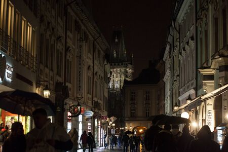 PRAGUE - CZECHIA - OCTBER 31, 2019: Powder tower, or Prasna Brana, taken from the narrow street of Celetna in Old Town at night. Prasna brana is a gothic tower, a former gate of the medieval city of Prague.Picture of the Powder Gate, or Prasna Brana, taのeditorial素材