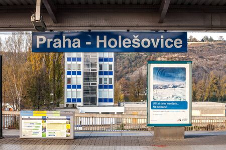 PRAGUE, CZECHIA - OCTOBER 31, 2019: Sign indicating the Praha Holesovice train station in Prague, on its arrival and departure platform. It's one of the main railway hubs of the city.Picture of a sign with the name of the train station of Praha Holesoviのeditorial素材