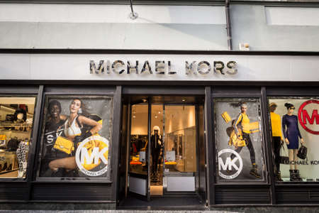 PRAGUE, CZECHIA - NOVEMBER 1, 2019: Michael Kors logo in front of their boutique for Prague. Michael Kors is an American luxury fashion designer & manufacturer famous for bags, clothes & shoes.

Picture of a sign with the logo of Michael Kors on their shoのeditorial素材
