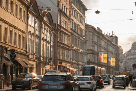 PRAGUE, CZECHIA - OCTOBER 31, 2019: Panorama of Jindrisska street in Prague Old Town at sunset in fall with tram passing by stuck in a traffic jam. Prague trams are main transportation system in the city.

Picture of a tram passing by the tracks on the coのeditorial素材