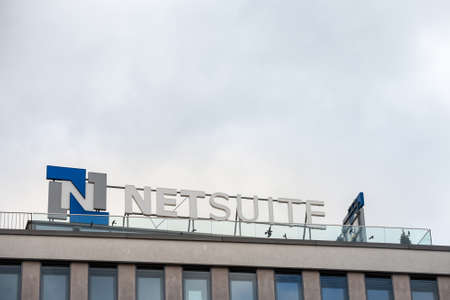 BRNO, CZECHIA - NOVEMBER 4, 2019: Netsuite logo in front of their main office for Brno. Part of Oracle, Netsuite is a Software development company specialized in CRM, ERP, PSA and Ecommerce solutions.

Picture of a sign with the logo of Netsuite taken on のeditorial素材