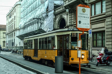 MILAN, ITALY - SEPTEMBER 2, 2009: Series 1500 tram, part of the Milan tram system, called ATM rete traviaria di milano, at a tram stop. It is the main public transportation system of the city.

Picture of a tram entering a tram stop in the city center of のeditorial素材