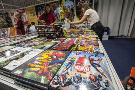 BELGRADE, SERBIA - OCTOBER 25, 2019: Covers of books of Marvel comics in rows on the shelves of a...