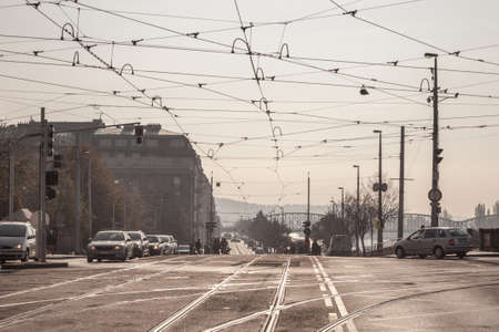 PRAGUE, CZECHIA - OCTOBER 10, 2019: Cars and other vehicles driving and passing by tram tracks on the Masarykovo Nabrezi quay, a major road in downtown Prague near Vltava river.Pictures of Masarykovo nabrezi quay in Prague, Czech republic, a major road のeditorial素材