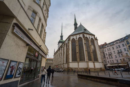 BRNO, CZECHIA - NOVEMBER 5, 2019: St james Church, also called Kostel Svateho Jakuba, in the historical center. The Church os Saint james is one major Catholic medieval church of Moravia.Picture of the Saint James Church in brno, Czech republic with pedのeditorial素材
