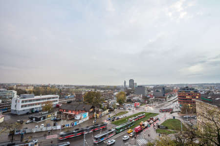BRNO, CZECHIA - NOVEMBER 5, 2019: Aerial panorama of Brno, Czech Republic, with a focus on Mala Amerika district withs trams passing by in front of a traffic jam, with skyscrapers in background.Landscape of Brno, Czech Republic, seen from above,  duringのeditorial素材