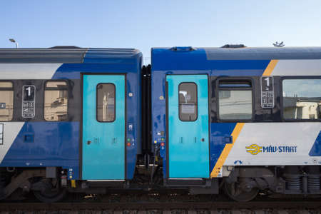 BRNO, CZECHIA - NOVEMBER 6, 2019: Mav Start logo on one of their passenger cars in an international train. Mav Start is the national Hungarian Railways carrier.Picture of a logo of Mav Start on one of their trains in a train station of Czechia. Hungariaのeditorial素材