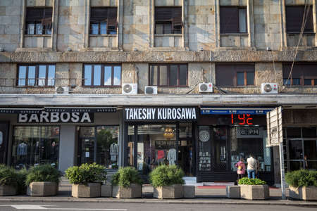 BELGRADE, SERBIA - APRIL 28, 2019: Takeshy Kurosawa in front of their boutique in Belgrade. Takeshy Kurosawa is an italian chain of fashion designer and retailer specialized in menswear and clothing. Picture of a sign with the of Takeshy Kurosawa taken onのeditorial素材