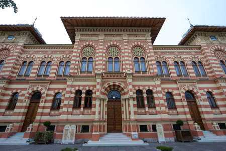 BRCKO, BOSNIA - MAY 6, 2017: Facade and entrance of the main hall of the Vijecnica, the former...
